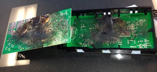 An inoperative electronic device sits on a table in a Charleston home, emphasizing the need for regular checks to keep appliances functioning well.