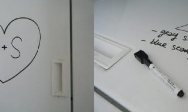 A refrigerator displaying a heart sketch in a Charleston kitchen, symbolizing love and adding a warm and inviting element to the kitchen decor.