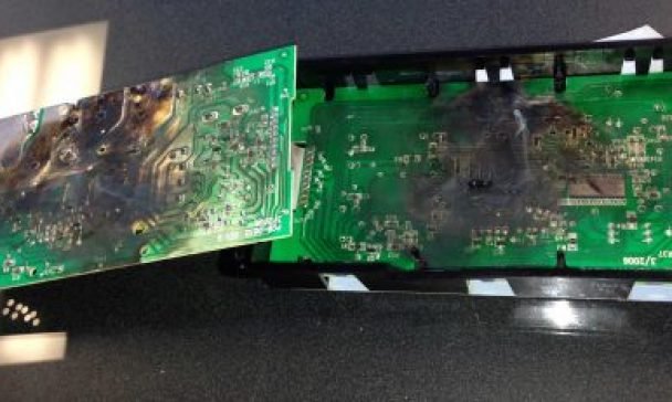 An inoperative electronic device sits on a table in a Charleston home, emphasizing the need for regular checks to keep appliances functioning well.